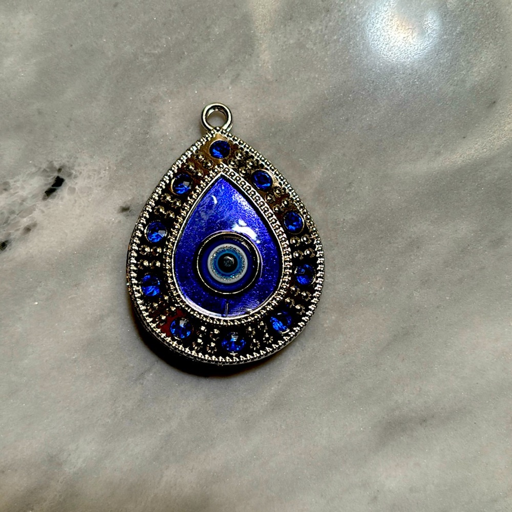 Evil eye charm to be hung in car or on keychain etc.